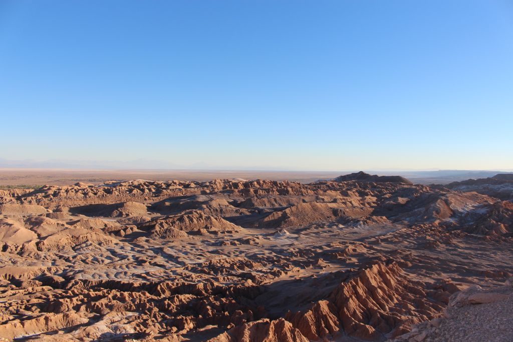 Sunset in Chile's Atacama Desert - An afternoon tour of the "Valley of the Moon" ends with seeing the sunset over the moon valley. A must see if you visit Chile!