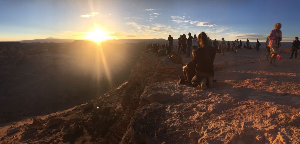 Sunset in Chile's Atacama Desert - An afternoon tour of the "Valley of the Moon" ends with seeing the sunset over the moon valley. A must see if you visit Chile!