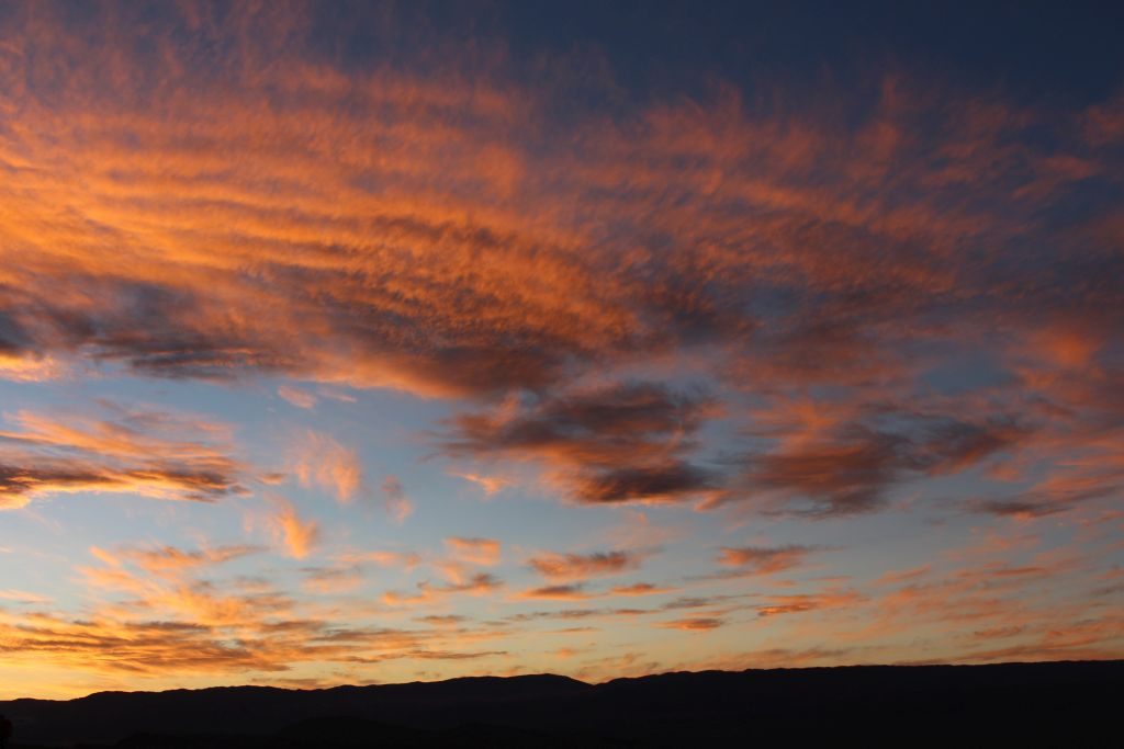 Sunset in Chile's Atacama Desert - An afternoon tour of the "Valley of the Moon" ends with seeing the sunset over the moon valley. A must see if you visit Chile!
