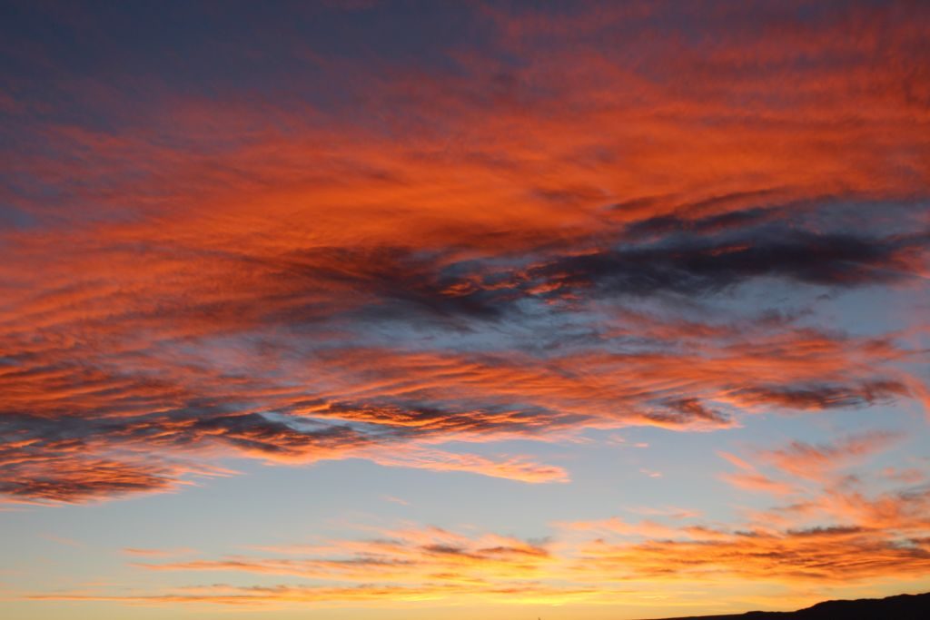 Sunset in Chile's Atacama Desert - An afternoon tour of the "Valley of the Moon" ends with seeing the sunset over the moon valley. A must see if you visit Chile!