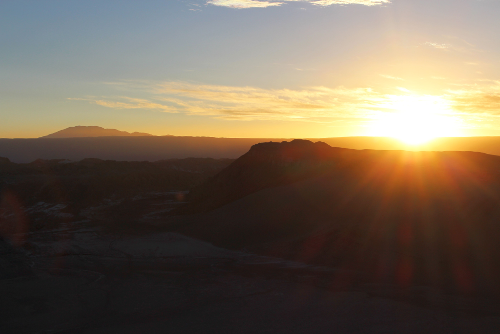 Sunset in Chile's Atacama Desert - An afternoon tour of the "Valley of the Moon" ends with seeing the sunset over the moon valley. A must see if you visit Chile!